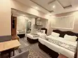 Трёхместный номер Deluxe