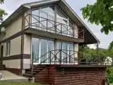Коттедж с балконом