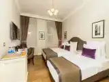 Трёхместный номер Deluxe