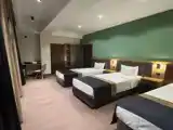 Трёхместный номер Стандарт с балконом