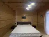 Коттедж с балконом и с красивым видом из окна