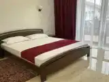 Четырёхместный номер Deluxe с балконом и с красивым видом из окна
