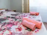 Четырёхместный номер Стандарт с балконом и с красивым видом из окна