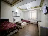 Трёхместный номер Deluxe с балконом и с красивым видом из окна