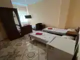 Четырёхместный люкс с балконом и с видом на внутренний двор