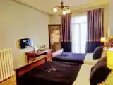 Трёхместный номер Superior с балконом