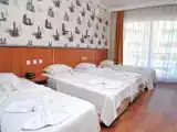 Четырёхместный номер Стандарт с балконом