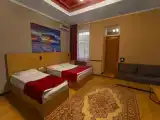 Трёхместный номер Deluxe