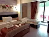 Четырёхместный номер Комфорт с балконом и с красивым видом из окна