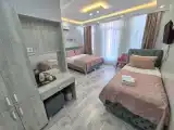 Трёхместный номер Deluxe с балконом и с видом на город