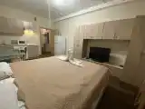 Студия с балконом и с красивым видом из окна