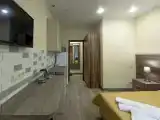 Студия с видом на город