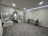 Четырёхместный номер Superior с балконом и с видом на город