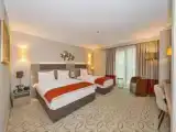 Трёхместный номер Deluxe