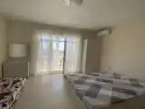 Студия с балконом и с красивым видом из окна
