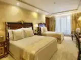 Трёхместный номер Deluxe