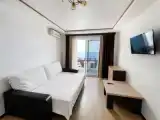 Апартаменты с 2 комнатами с балконом и с видом на море