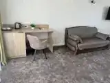 Четырёхместный люкс с балконом и с красивым видом из окна