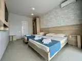 Трёхместный номер Стандарт с балконом и с видом на внутренний двор