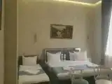 Трёхместный номер Deluxe
