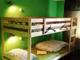 Кровать в общем номере (мужской номер) с балконом