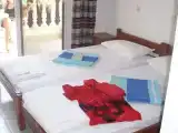 Трёхместный номер Стандарт с балконом и с видом на сад