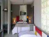 Трёхместный номер Стандарт с балконом и с видом на сад