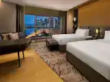 Четырёхместный номер Premier Prestige с балконом и Marina Bay view