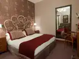 Трёхместный номер Deluxe