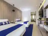 Четырёхместный люкс Deluxe c 1 комнатой oceanfront