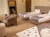 Трёхместный номер с видом на сад
