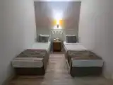 Четырёхместный семейный номер Стандарт с видом на окрестности