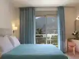 Номер с частичным видом на море