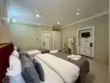 Трёхместный номер Deluxe
