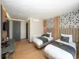 Трёхместный номер Deluxe