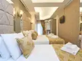 Трёхместный номер Deluxe
