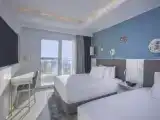 Четырёхместный номер Deluxe с частичным видом на море