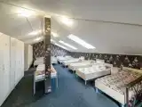 Кровать в общем номере
