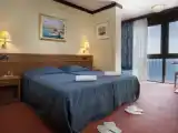 Двухместный номер с дополнительной кроватью с видом на море