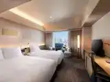 Трёхместный номер Deluxe