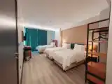 Трёхместный номер Deluxe