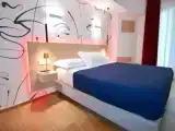 Трёхместный номер Deluxe