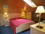 Четырёхместный номер семейный Мансарда