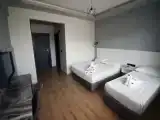 Трёхместный номер Стандарт с балконом