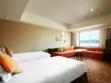 Трёхместный номер Corner Deluxe