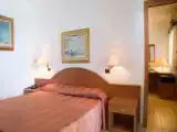 Четырёхместный семейный номер Стандарт с патио