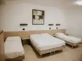 Четырёхместный семейный номер Комфорт с балконом и с видом на внутренний двор