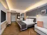 Люкс Family Deluxe with side sea and pool view