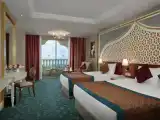 Трёхместный номер Superior с частичным видом на море
