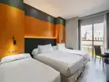 Двухместный номер с дополнительной кроватью Deluxe